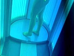 Mommy and stepson have a threesome in the tanning bed