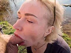 MILF pornstar Cherry Aleksa gives a homemade blowjob on the lake