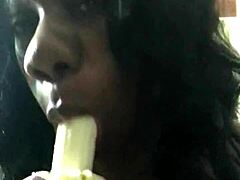 Sensual MILF indulges in deepthroating a banana