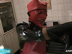 Rubbernurse Agnes in latex dress and apron: BDSM and pegging with dildo
