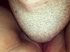Close-up of a mature woman's pleasure as she reaches orgasm from cunnilingus