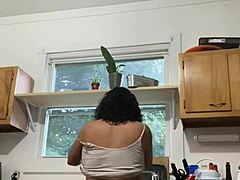 Latina mature woman enjoying household chores