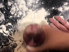 Mature woman prepares penis with flour for intimate dinner